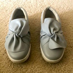 Gray slip on sneakers